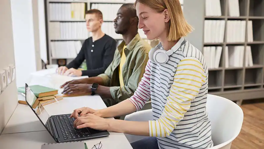 Group of employees with visual impairments in a modern office.